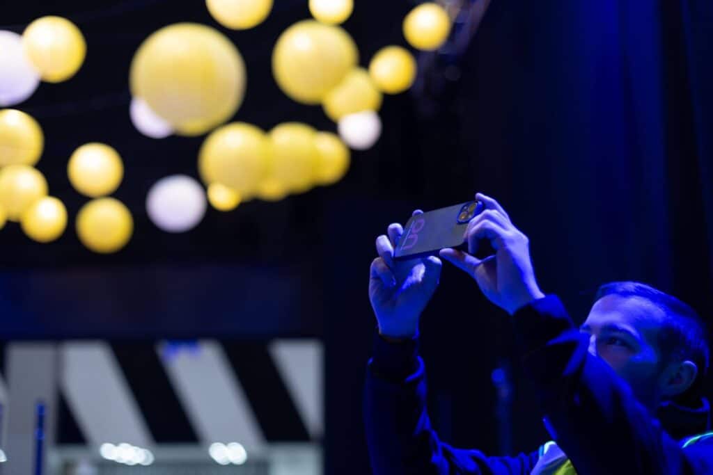 On Event Production Company | Live, Hybrid and Virtual Event Production | Man taking pictures