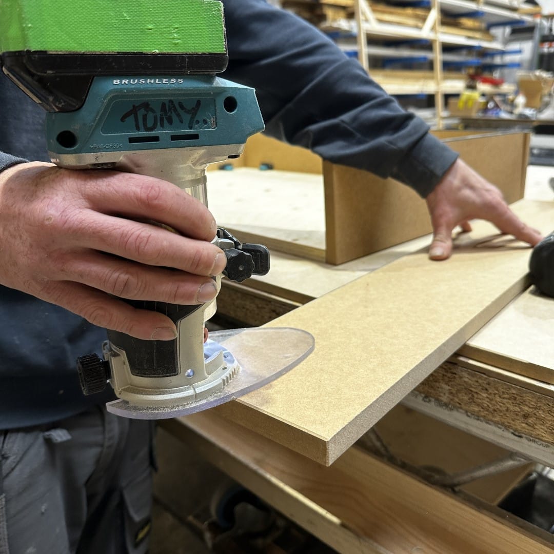 Bespoke Fabrication On Event Production Company | Live, Hybrid and Virtual Event Production | Sanding chipboard