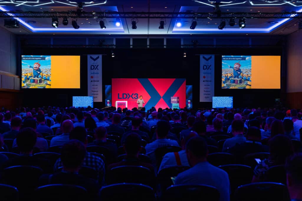 On Event Production Company | Live, Hybrid and Virtual Event Production | LDX3 speaker on stage