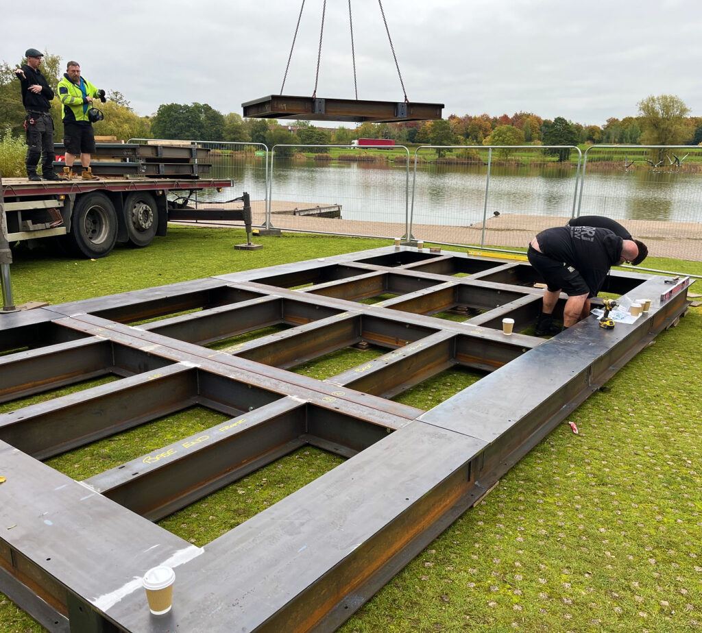 On Event Production Company | Live, Hybrid and Virtual Event Production | JCB Toy Box Exhibition build base