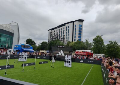 On Event Production Company | Live, Hybrid and Virtual Event Production | Grass sports pitch with pop up bars