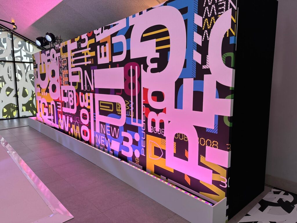 On Event Production Company | Scenic Production for Live, Hybrid and Virtual Events | Graphic Wall